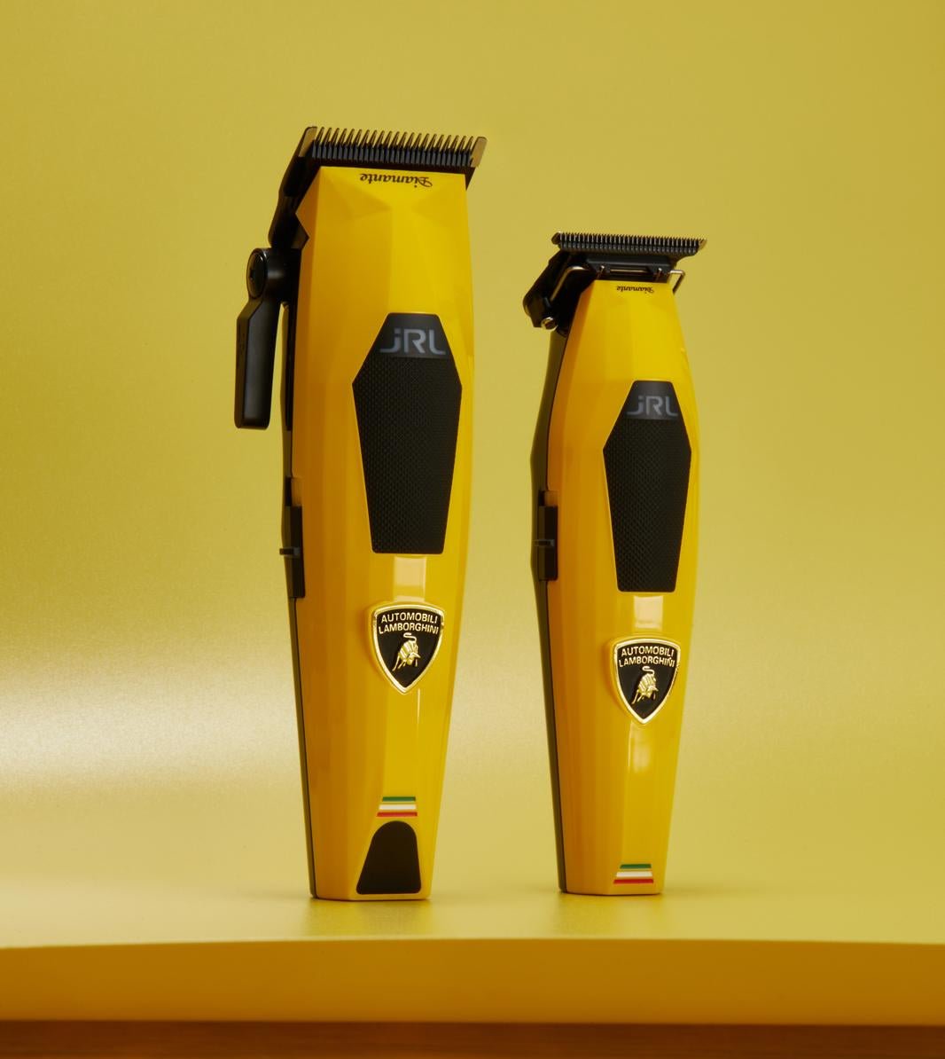 Two yellow hair trimmers with black accents on a yellow background